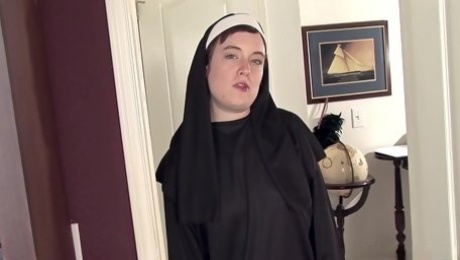 Pretty nun plays with her hairy pussy alone