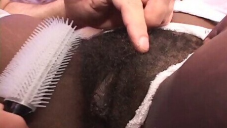 Black bitch gets her hairy cunt combed and fucked in all positions