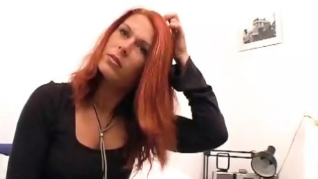 Redhead beauty from Germany making her pussy wet with her sex toy
