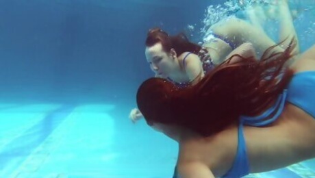 Two Hot Lesbian Brunettes In The Swimming Pool